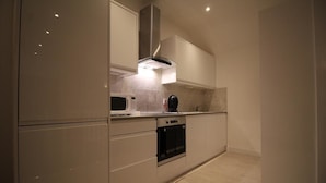 Exclusive Apartment, 1 Bedroom, Non Smoking | Private kitchen | Fridge, stovetop - Exquisite 1 Bed Apartment near Heathrow (Staines)