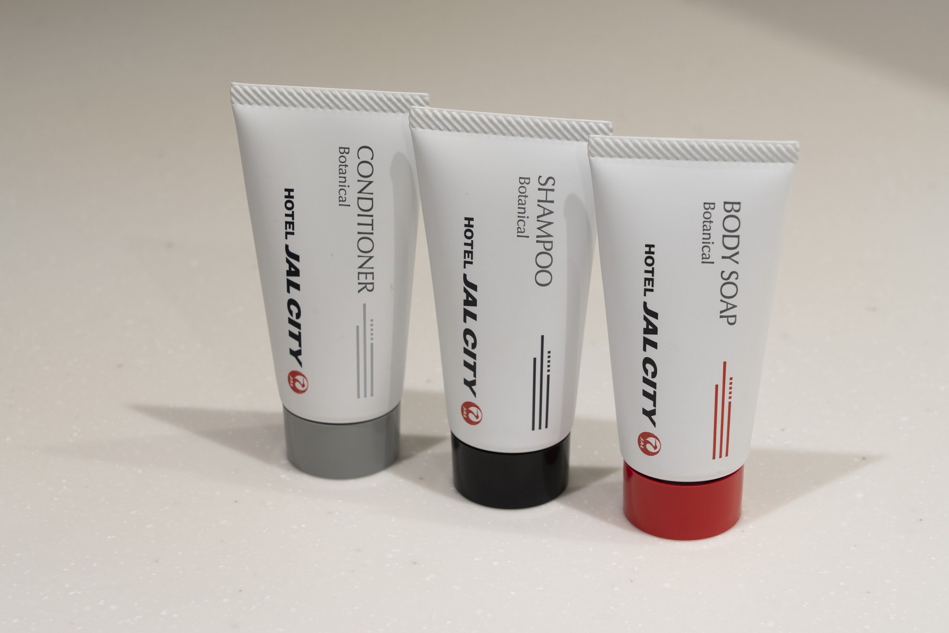 separate bathtub and shower, rainfall showerhead, hair dryer, slippers