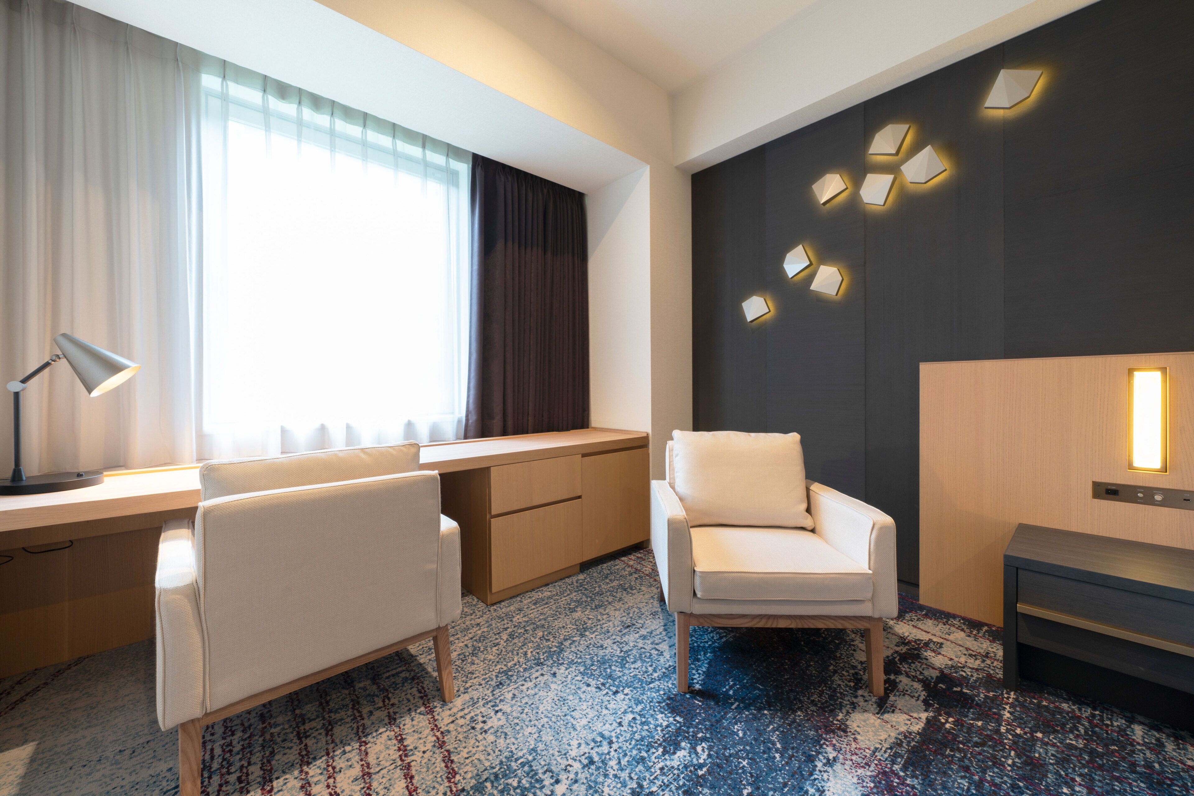 simple twin room | in-room safe, desk, blackout curtains, iron/ironing board