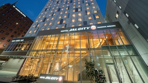 A modern hotel building with a prominent sign for 'Hotel Jal City Nagoya Nishiki'. - Hotel JAL City Nagoya Nishiki (Nagoya)