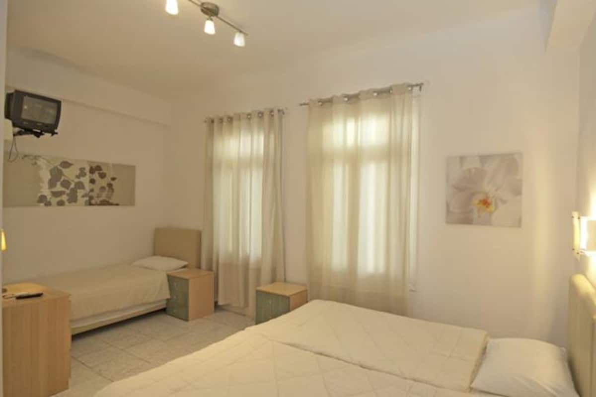 Habitación triple | Sistema de insonorización y ropa de cama