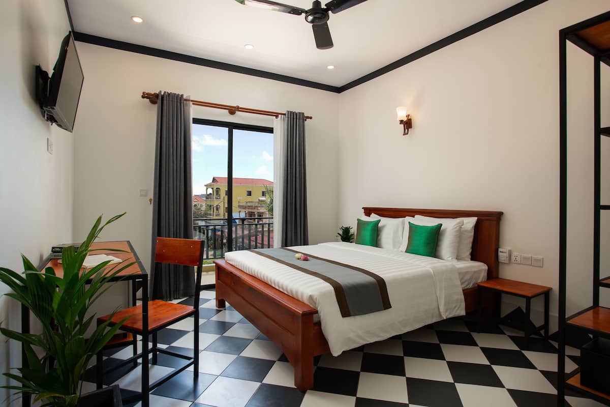 Kamar Double Deluks, 1 Tempat Tidur King, pemandangan kota | Kedap suara, Wi-Fi gratis, dan seprai linen
