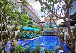 Outdoor pool, open 9 AM to 9 PM, pool umbrellas