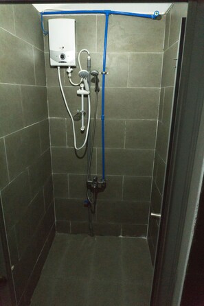 Shower, hair dryer, slippers, towels