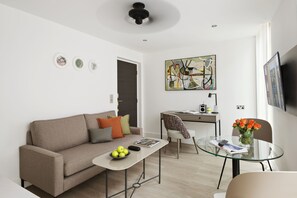 Suite, 1 chambre | Coin séjour