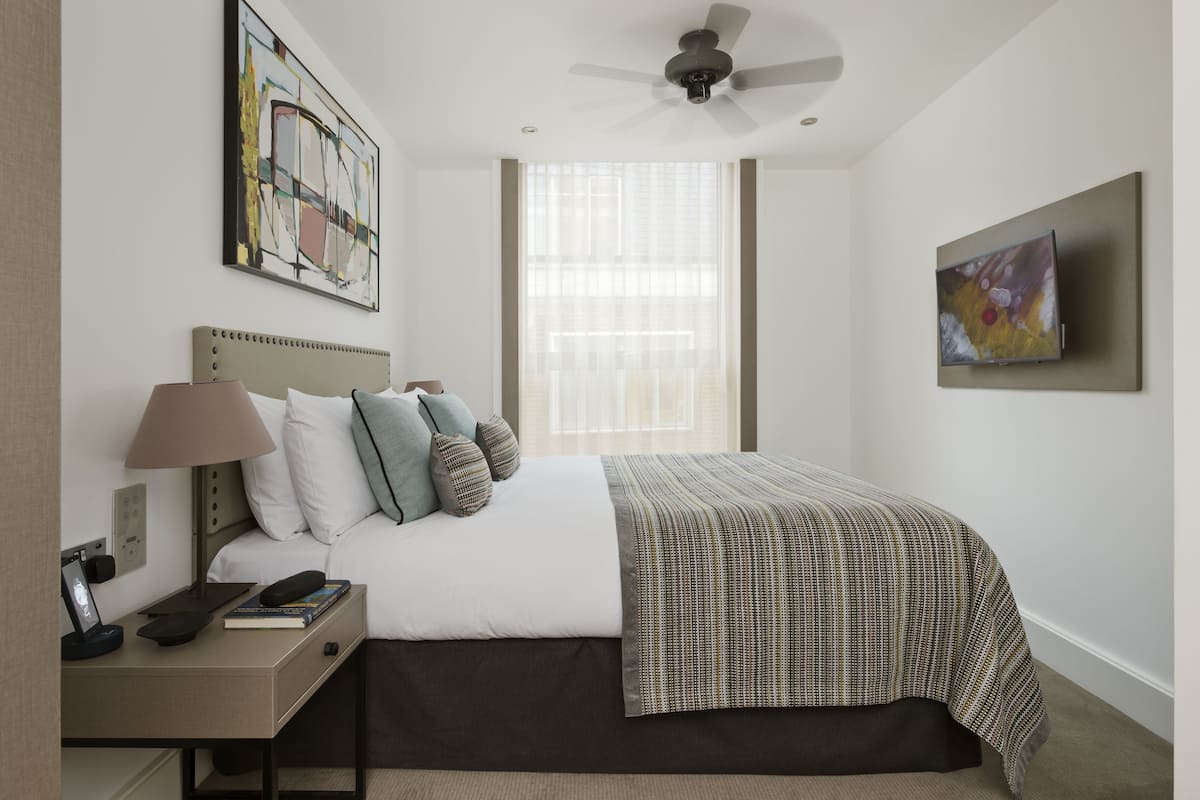 Suite ejecutiva, 1 habitación | Ropa de cama de alta calidad, caja fuerte, sistema de insonorización
