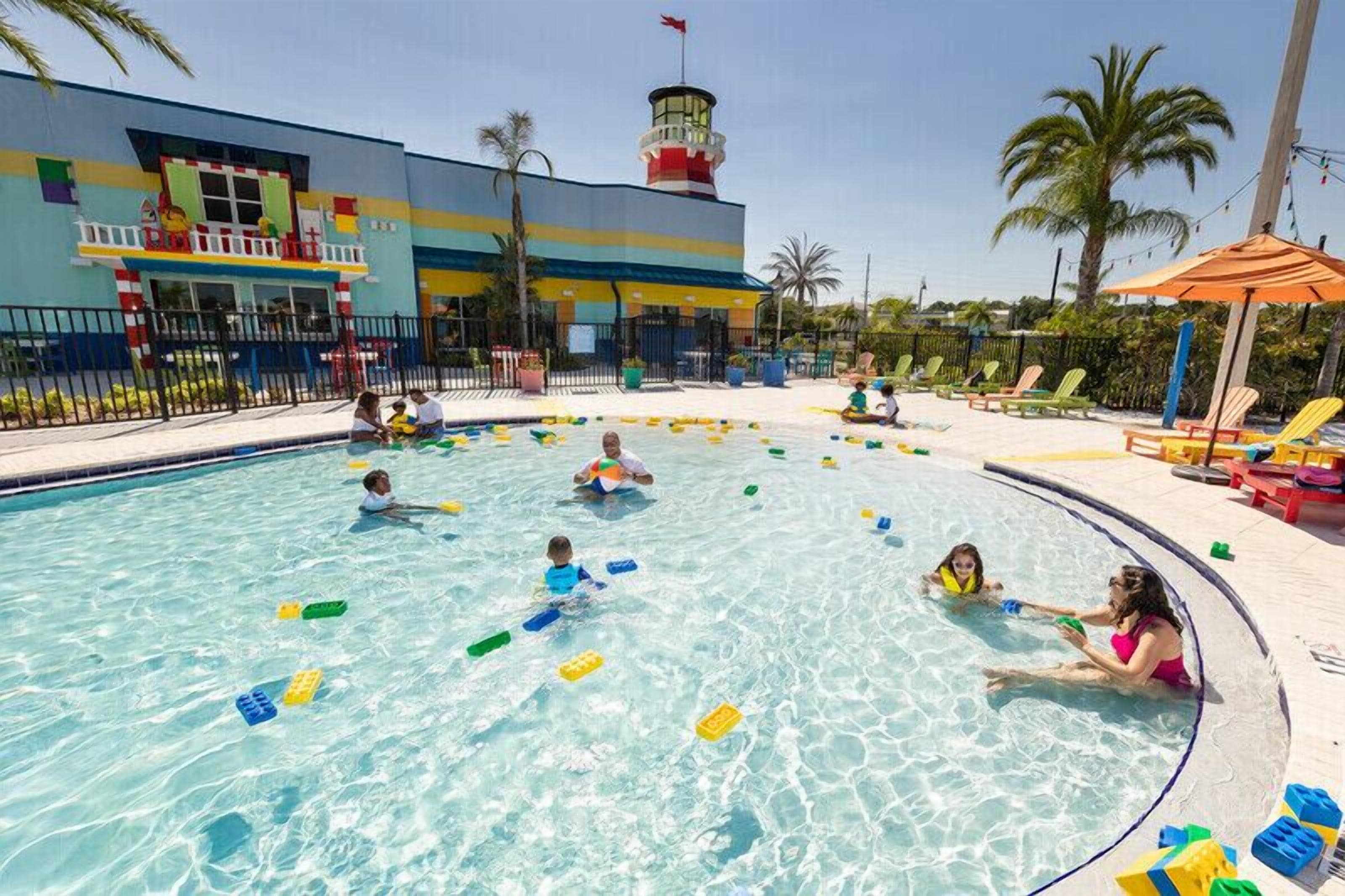 outdoor pool, open 9:00 am to 9:00 pm, pool umbrellas, pool loungers