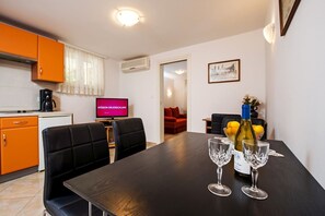 Apartment, 1 Queen Bed | Private kitchen | Fridge, stovetop, espresso maker, electric kettle