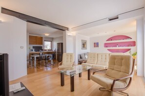 Apartamento, várias camas | Sala de estar