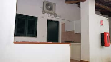 Full-size fridge, cookware/dishes/utensils