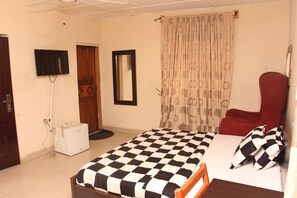 エグゼクティブ ルーム 禁煙 | 1 室のベッドルーム、ミニバー、デスク、ベッドシーツ