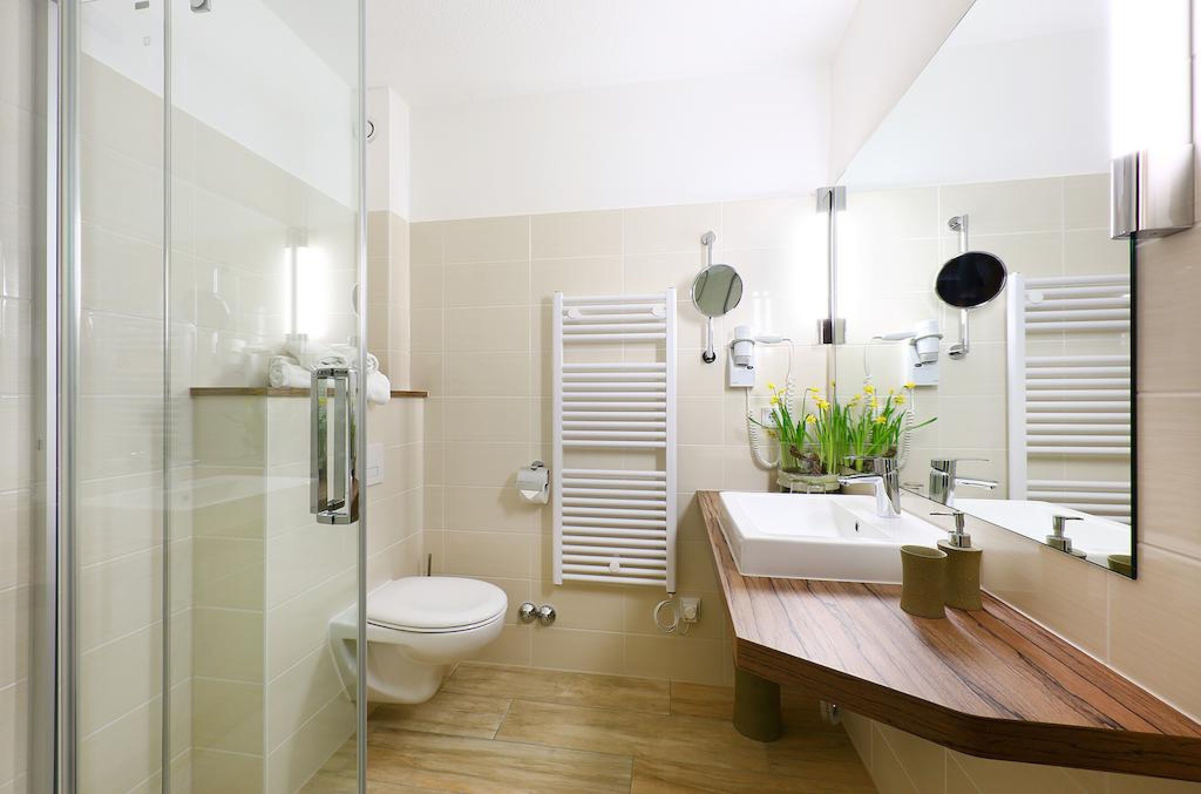 deep-soaking bathtub, rainfall showerhead, free toiletries, hair dryer