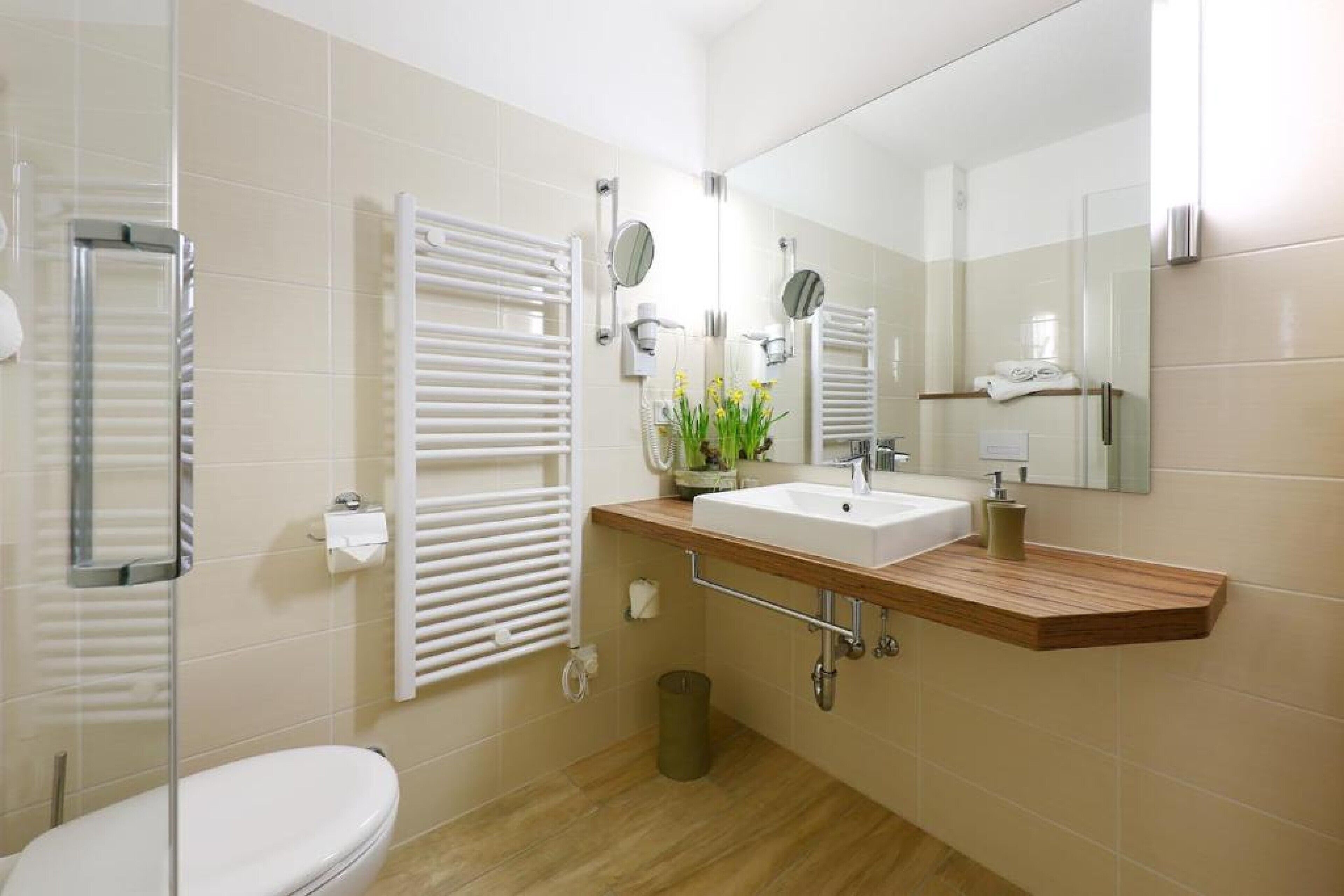 deep-soaking bathtub, rainfall showerhead, free toiletries, hair dryer