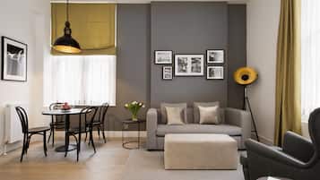 Suite, 1 Bedroom | Living area | Flat-screen TV