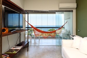 Apartamento, 1 cama de casal, para não fumantes | Área de estar | TV LED