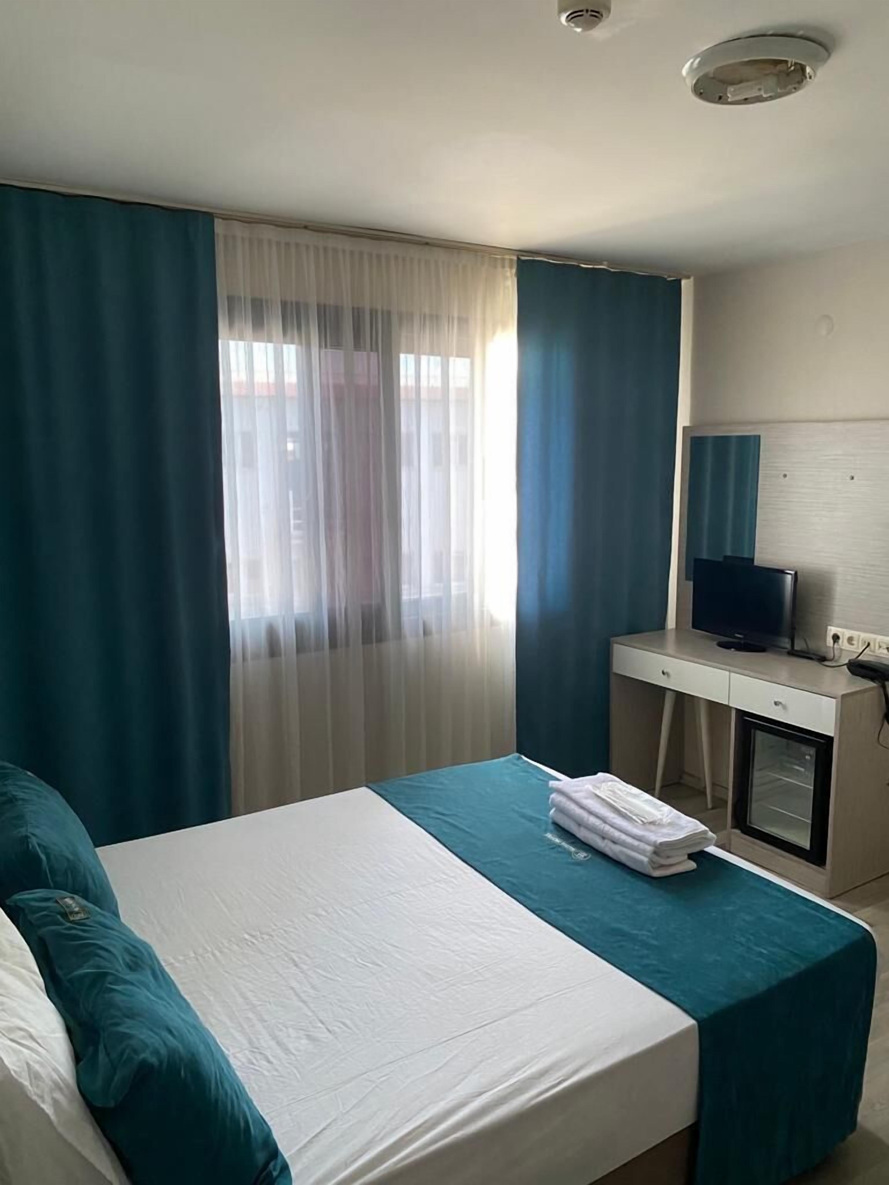 minibar, desk, blackout curtains, soundproofing