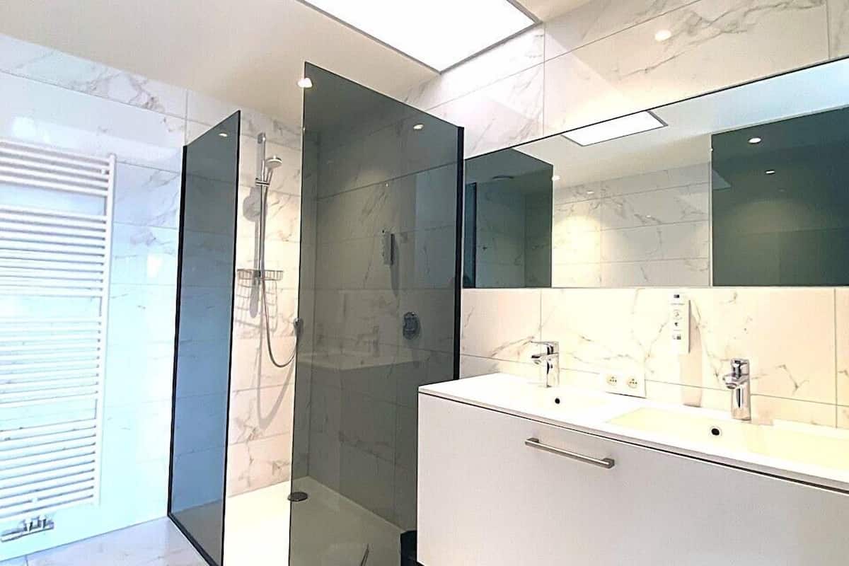 deluxe double room, 1 king bed | bathroom | free toiletries, hair dryer, towels, soap