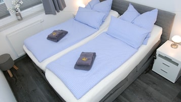 2 bedrooms, in-room safe, iron/ironing board, free cots/infant beds