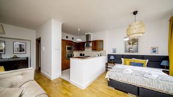 Apartemen Premium | Area keluarga | TV layar datar