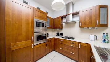 Premium Apartment | Living area | Flat-screen TV