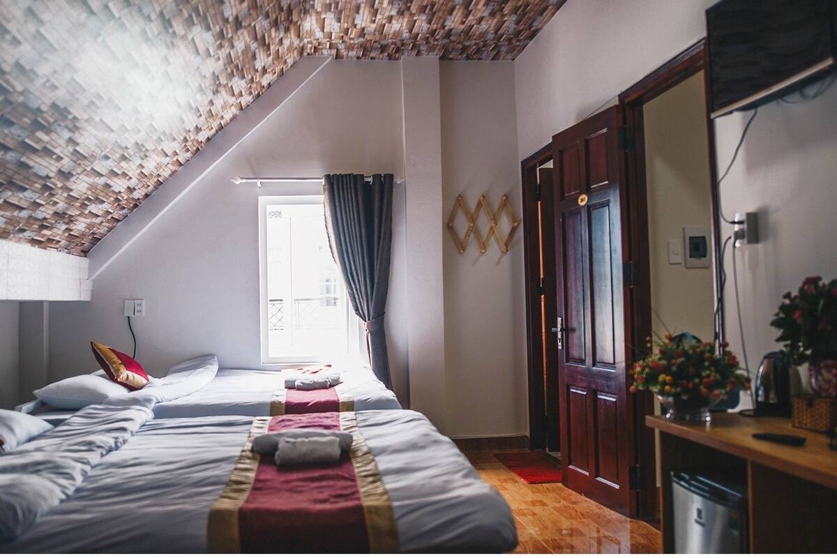 Triple Room | Minibar, desk, iron/ironing board, free WiFi