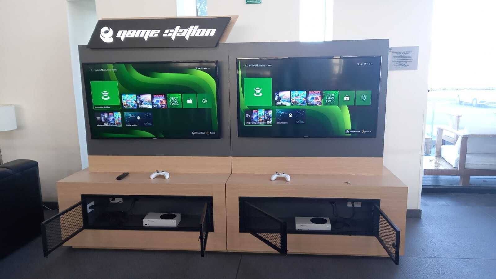 A Game Station with two large screens displaying game interfaces.