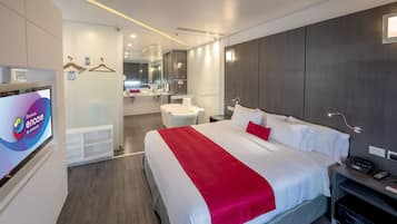 Suite, 1 King Bed, Non Smoking | In-room safe, laptop workspace, iron/ironing board