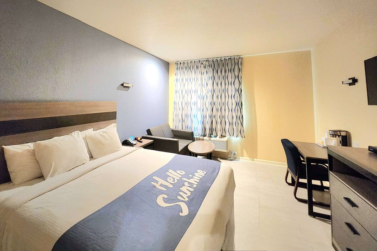 room, 1 king bed, non smoking (efficiency) | down duvets, pillow-top beds, desk, iron/ironing board