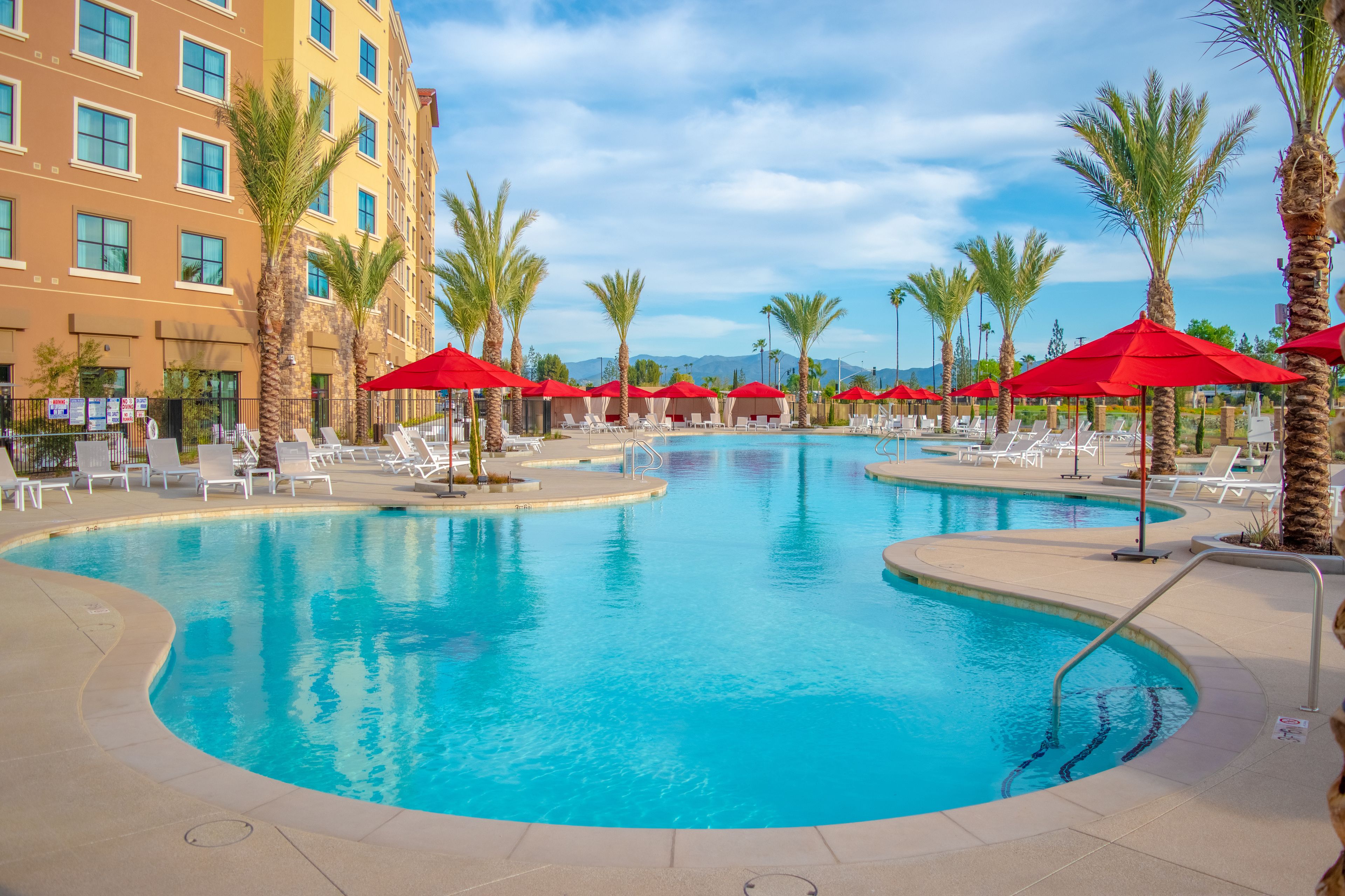 Outdoor pool, open 8:00 AM to 8:00 PM, cabanas (surcharge)