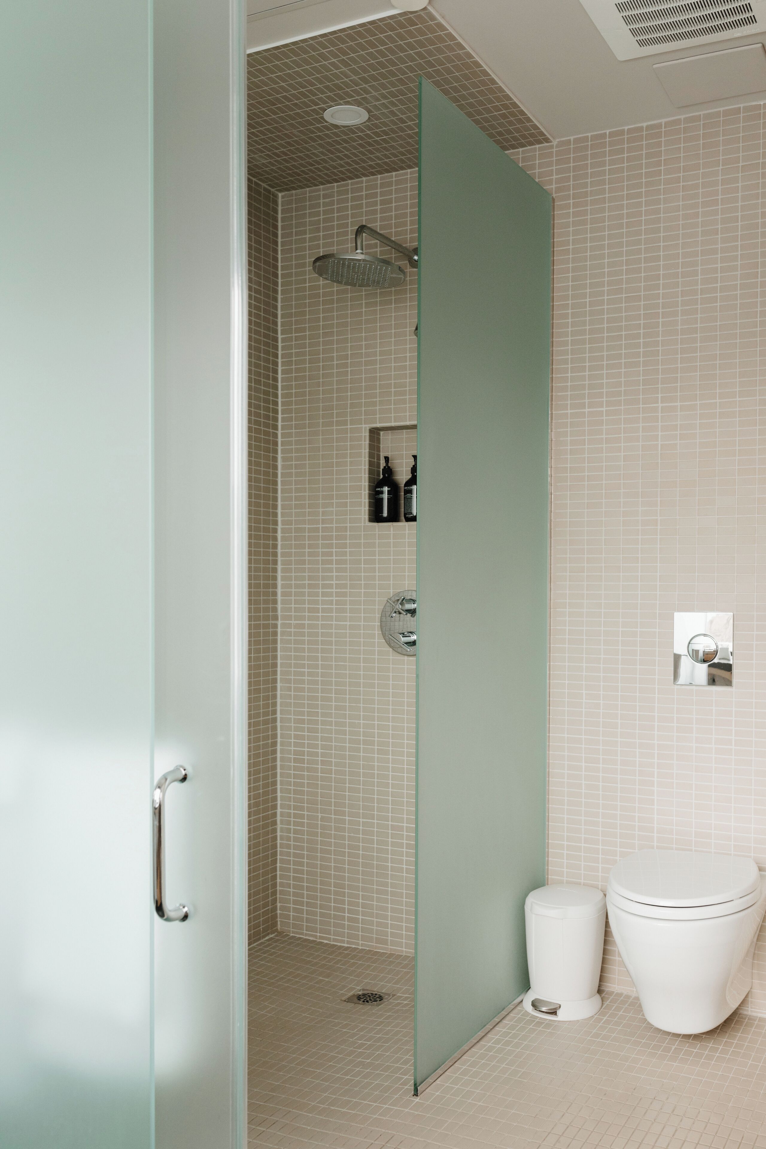 shower, rainfall showerhead, designer toiletries, hair dryer