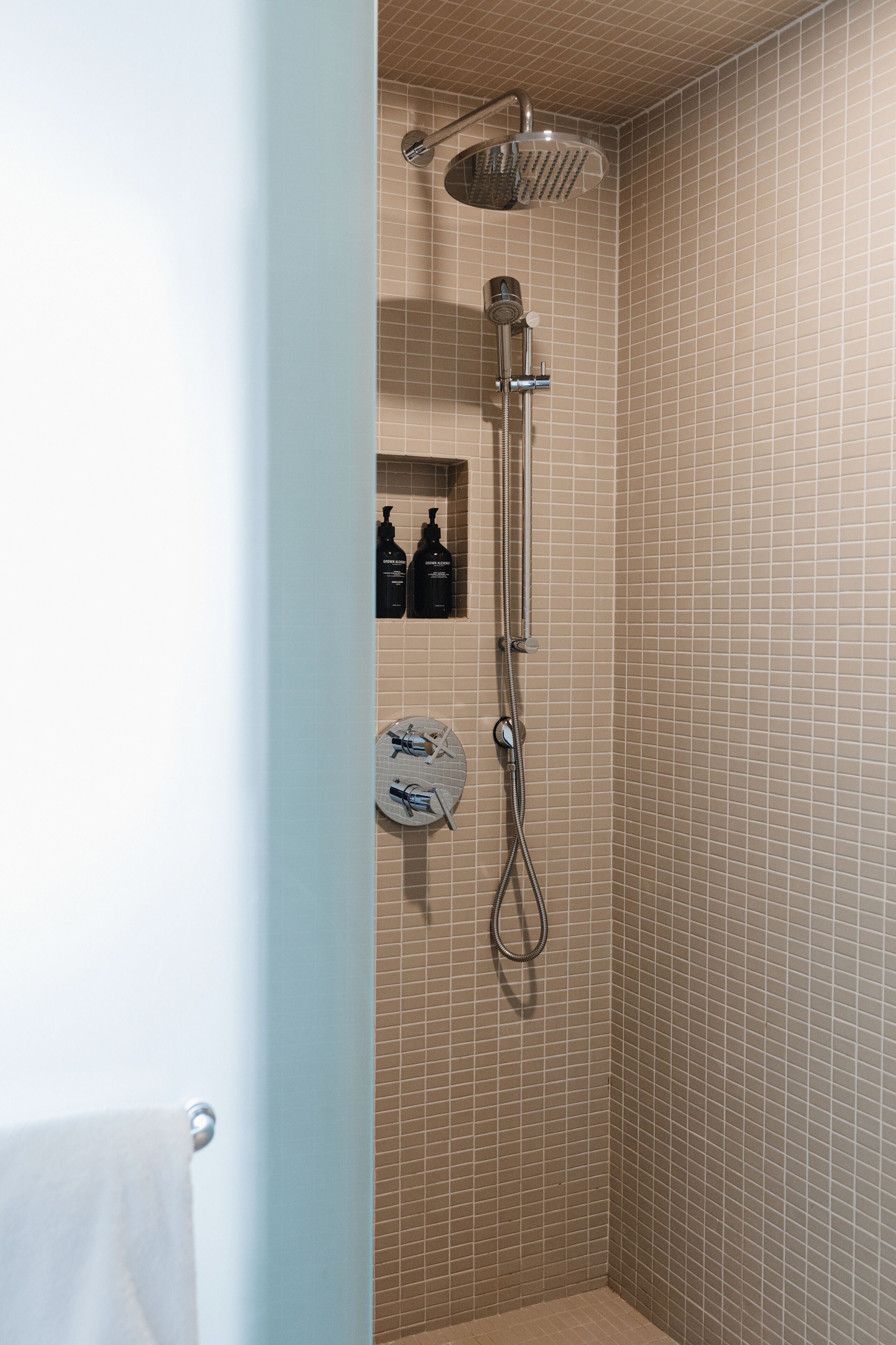 signature double room, 2 queen beds | bathroom | shower, rainfall showerhead, designer toiletries, hair dryer