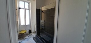 Shower, free toiletries, hair dryer, towels