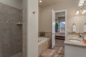 Bathtub, hair dryer, towels