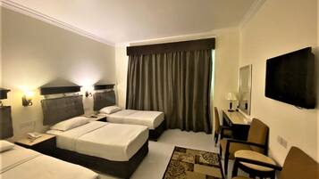 Triple Room, Pool Access | Egyptian cotton sheets, premium bedding, minibar, in-room safe