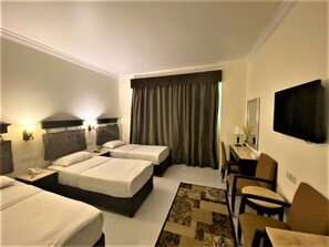 Triple Room, Pool Access | Egyptian cotton sheets, premium bedding, minibar, in-room safe - Signature Inn Deira - Free Parking (Dubai)