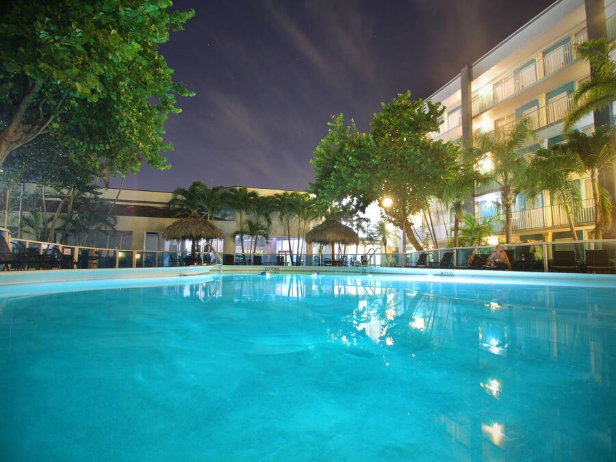 Outdoor pool, open 8:00 AM to 8:00 PM, free cabanas