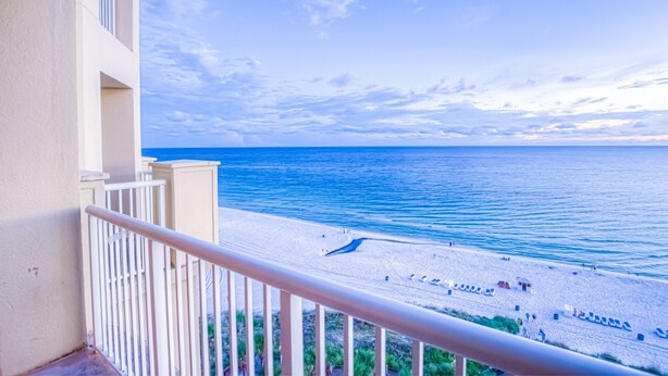 A balcony with a view of a beach and ocean. - Grand Panama by Aneliya's Rentals (Panama City Beach)