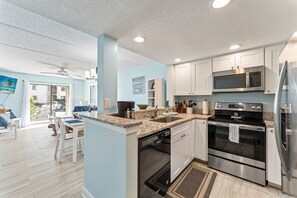 Fridge, microwave, oven, stovetop - Relaxing St. Augustine Beach Condo – Ground Floor, Steps to Ocean (St. Augustine)