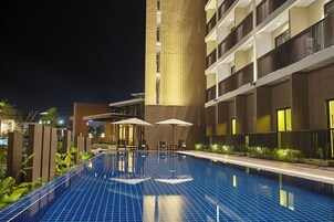 Outdoor pool, open 8:00 AM to 8:00 PM, pool umbrellas, sun loungers