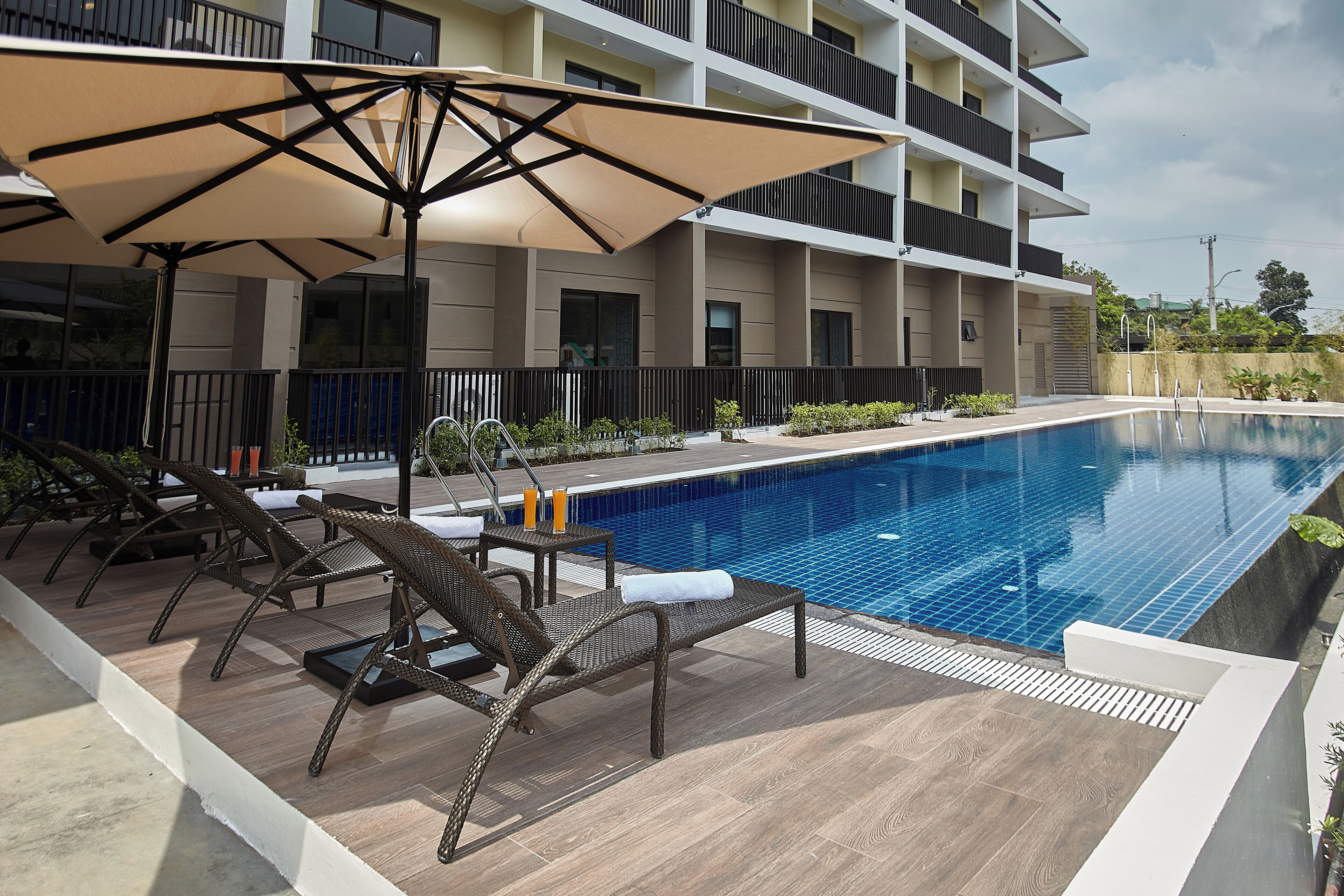 Outdoor pool, open 8:00 AM to 8:00 PM, pool umbrellas, sun loungers