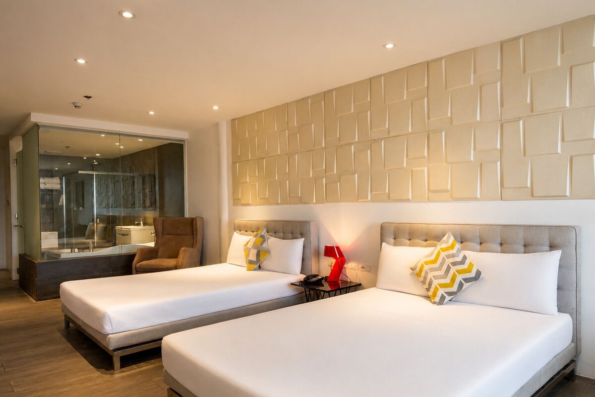 Deluxe kamer, 1 twee- of 2 eenpersoonsbedden | Luxe beddengoed, een kluis op de kamer, gratis wifi, beddengoed