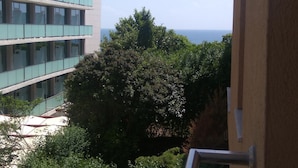 A multi-story building with balconies overlooking a body of water. - Vadim Apartments Vigo Panorama (Nessebar)