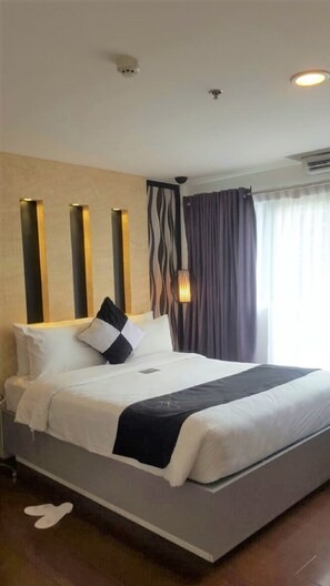 Blackout curtains, soundproofing, rollaway beds, free WiFi