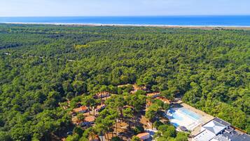 Indoor pool, outdoor pool, pool umbrellas, sun loungers