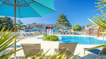 Indoor pool, outdoor pool, pool umbrellas, sun loungers