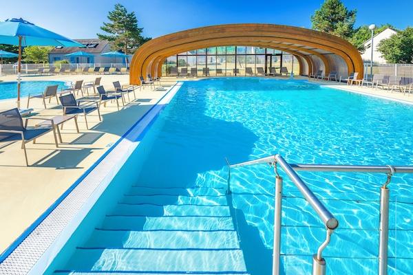 Indoor pool, outdoor pool, pool umbrellas, sun loungers