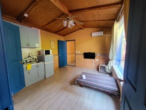 Family Room | Living area | 32-inch flat-screen TV with satellite channels, TV, heated floors