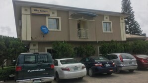 A building with a sign reading "Villa Savoye Hotels & Resorts." - Villa Savoye Hotels and Resorts (Lekki)