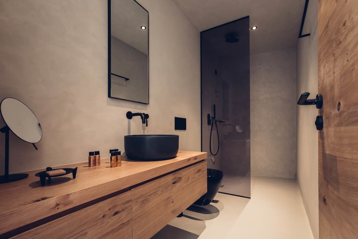 senior retreat with private pool & olive farm view | bathroom | rainfall showerhead, free toiletries, hair dryer, slippers