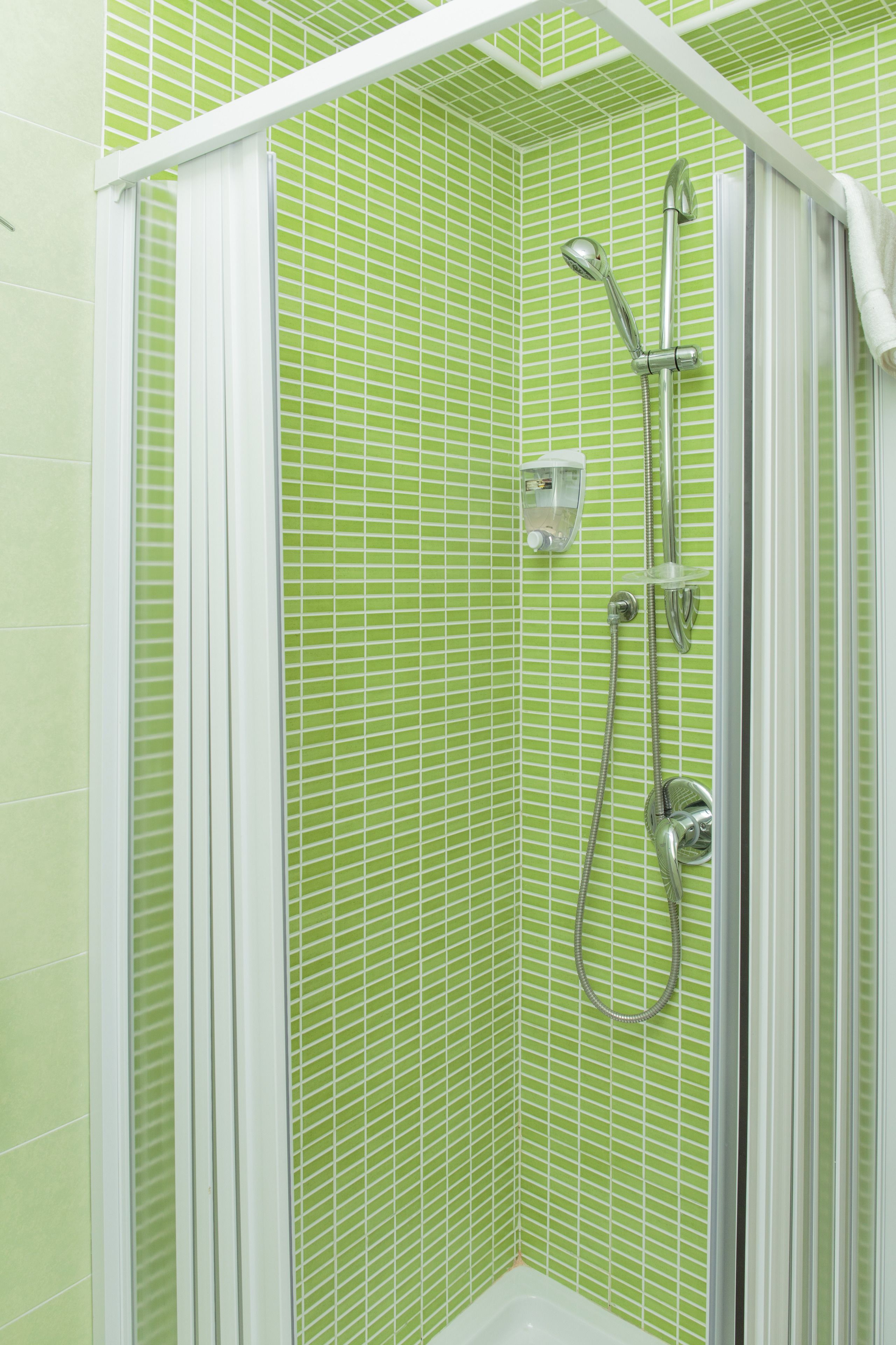 Apartment, Kitchen (Casa Candida) | Bathroom | Shower, free toiletries, hair dryer, slippers